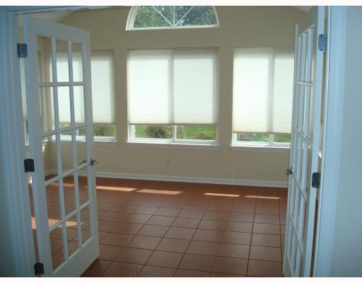 1024 Springfield Court Renfrew, PA 16053 - Photo 7 of 14 Other. A sunroom has French doors and ceramic tile floor.