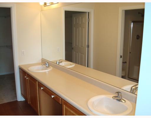 1024 Springfield Court Renfrew, PA 16053 - Photo 9 of 14 Master Bath/Spa. The master bath has double sinks and a seating area in the center of the vanity.