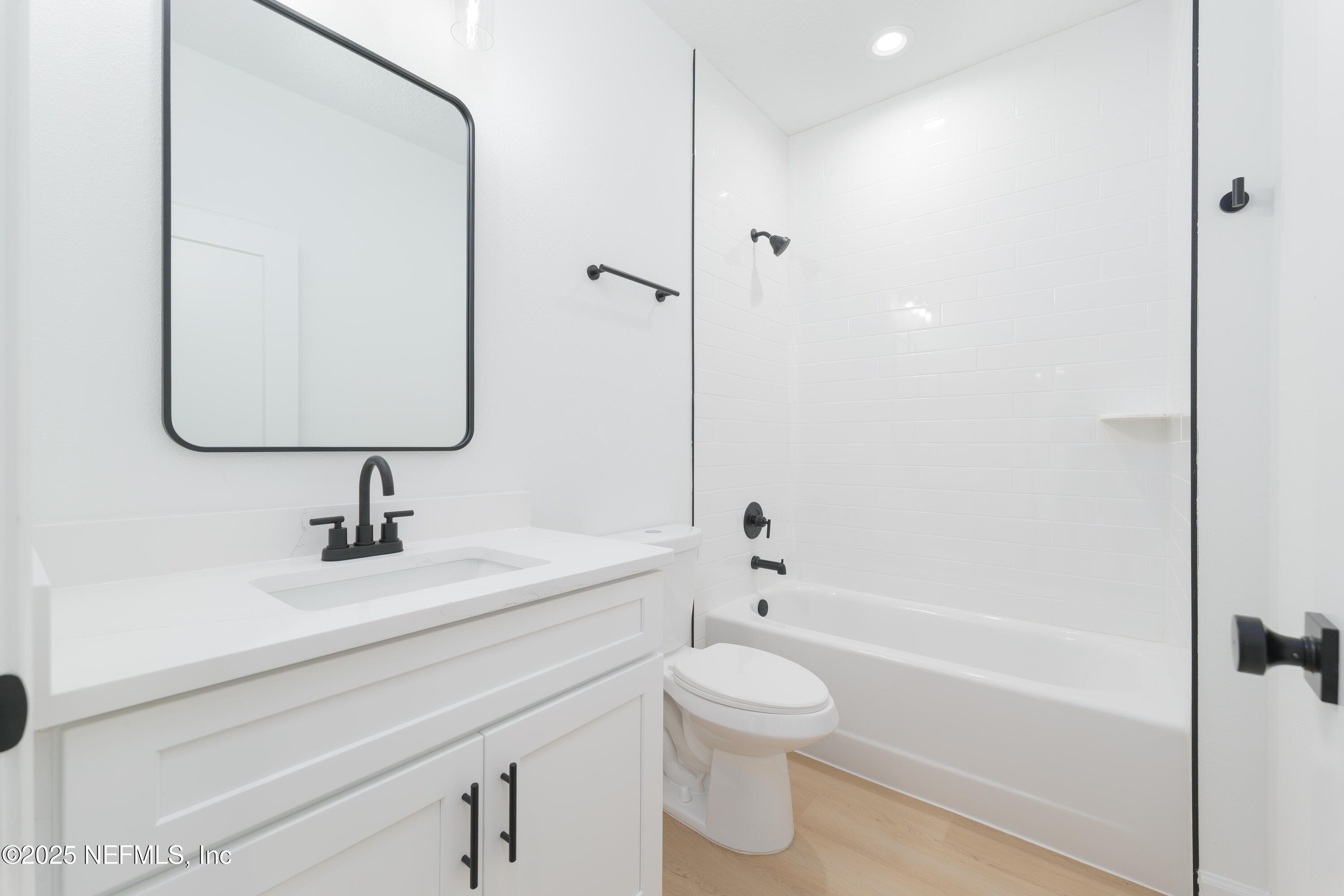 5294 County Road 352 Keystone Heights, FL 32656 - Photo 17 of 23 a bathroom with a sink a toilet and shower