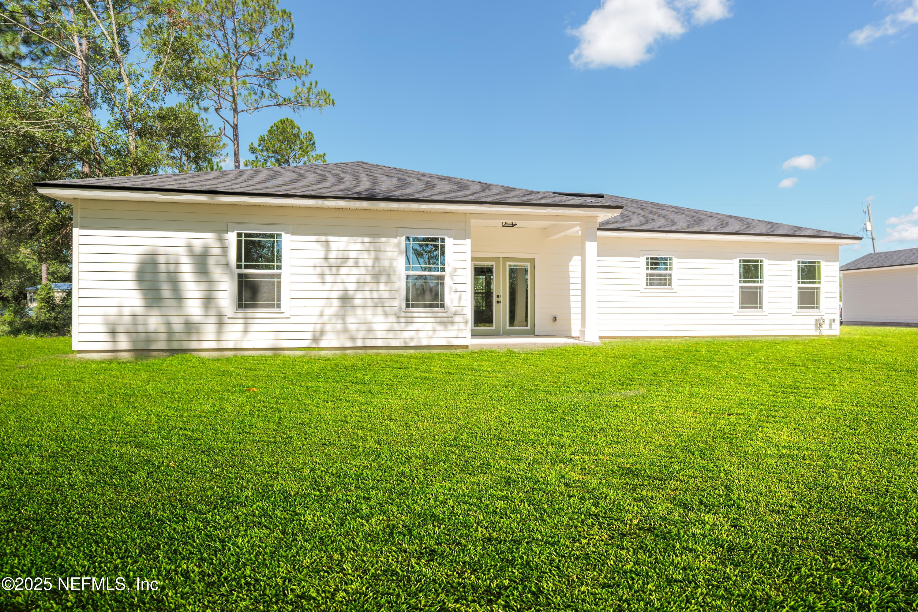5294 County Road 352 Keystone Heights, FL 32656 - Photo 23 of 23 a front view of a house with a garden