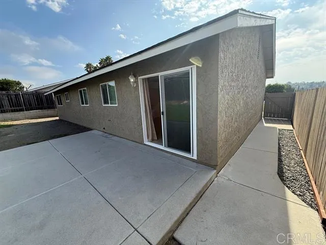 a front view of a house with entertaining space