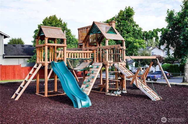 a view of a house with a park