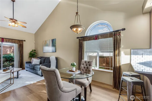 a view of a livingroom with furniture and window