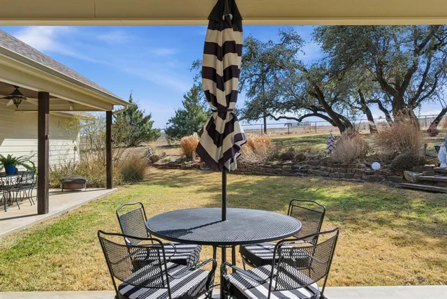 a swimming pool with some trees