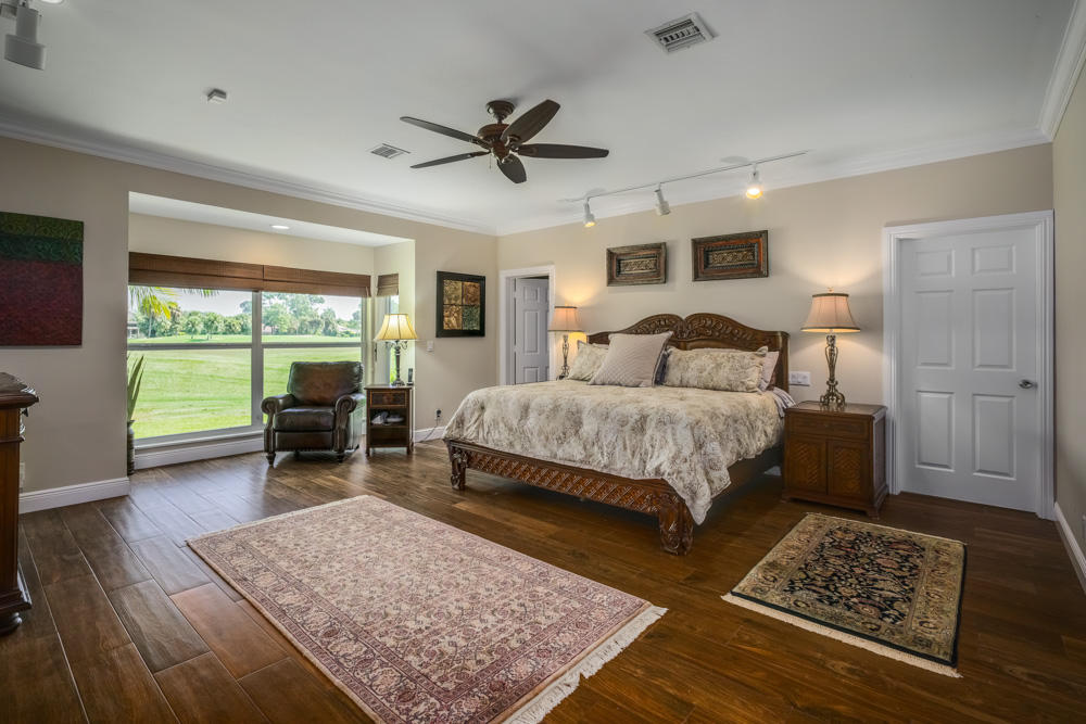 10 Wycliff Road Palm Beach Gardens, FL 33418 - Photo 11 of 41 13_master-bedroom_10 Wycliff Road_PGA Na