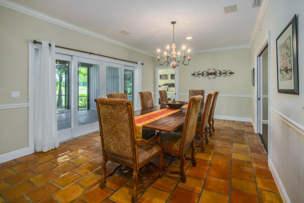 10 Wycliff Road Palm Beach Gardens, FL 33418 - Photo 6 of 41 06_dining-room_10 Wycliff Road_PGA Natio
