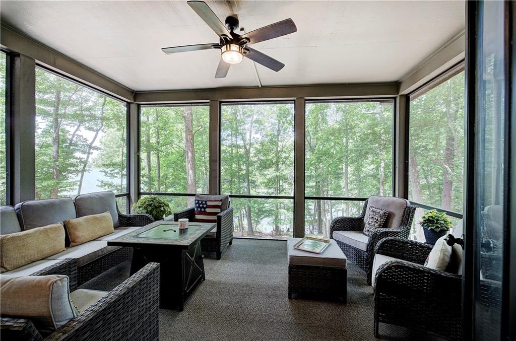 12 Tamarack Point Jasper, GA 30143 - Photo 6 of 83 a living room with furniture and a floor to ceiling window