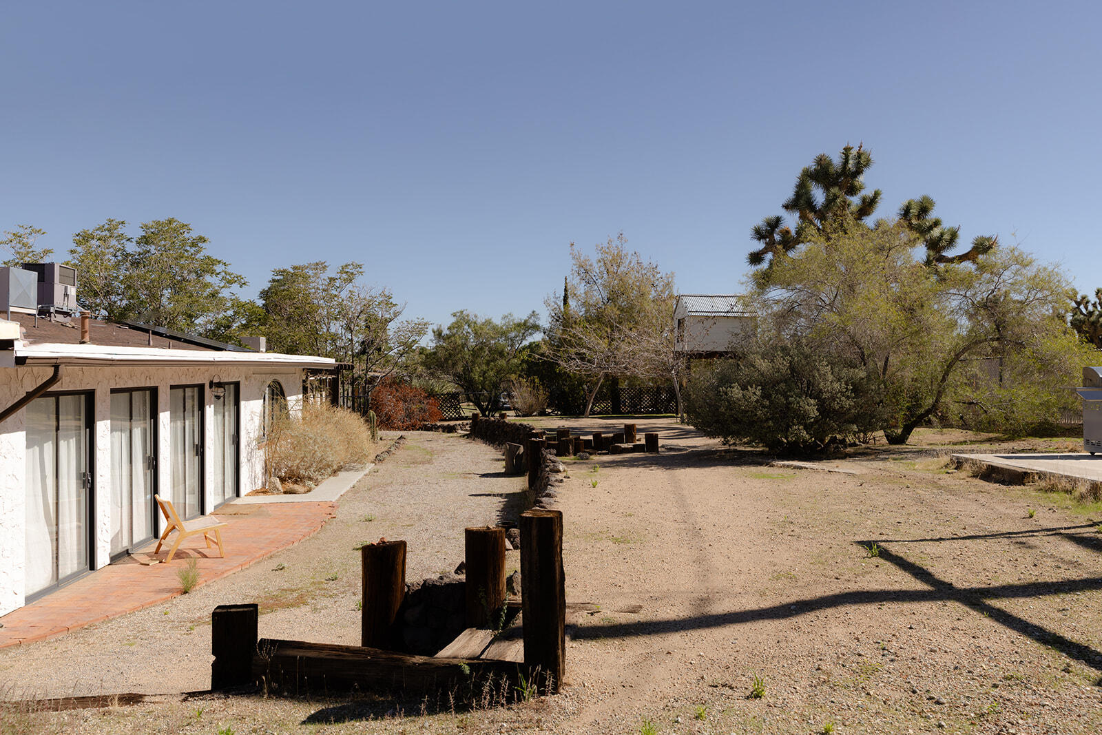 7995 Grand Avenue Yucca Valley, CA 92284 - Photo 26 of 26 a view of a terrace with chairs