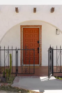 a view of a entrance gate of the house