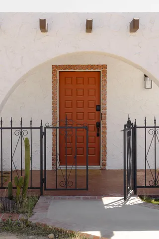 a view of a entrance gate of the house