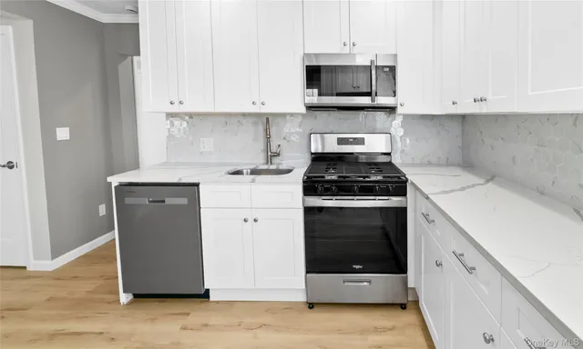 a view of a refrigerator in a kitchen