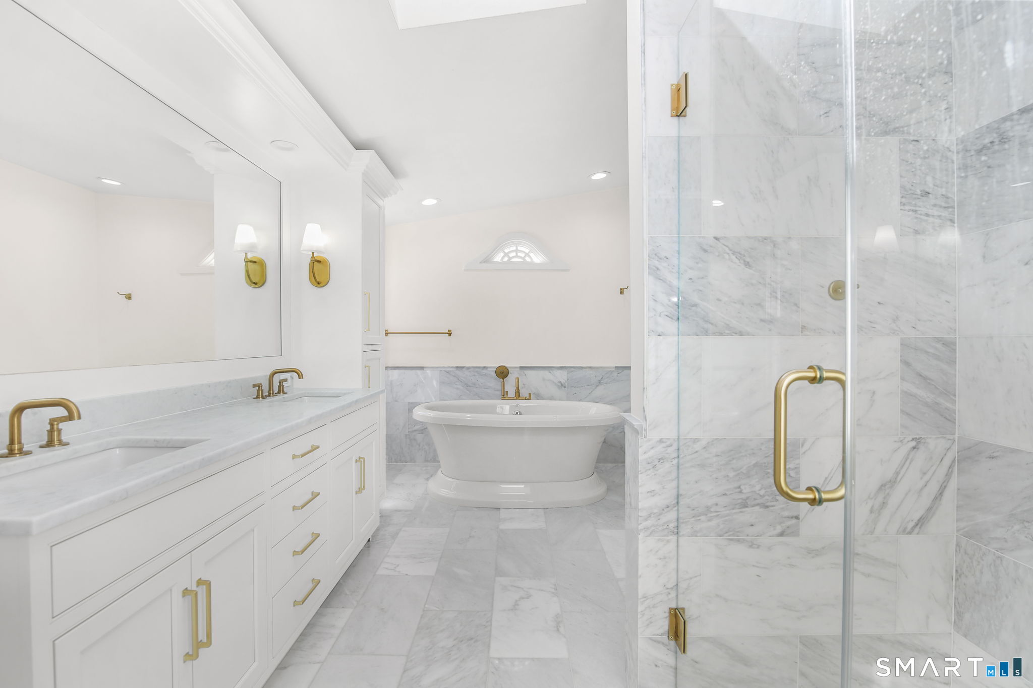 323 Smith Ridge Road New Canaan, CT 06840 - Photo 22 of 39 a bathroom with a double vanity sink mirror and shower