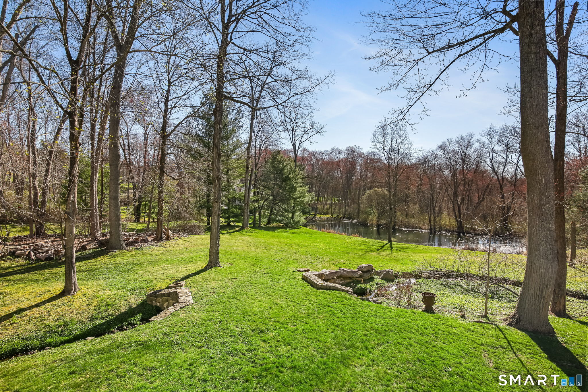 323 Smith Ridge Road New Canaan, CT 06840 - Photo 39 of 39 a view of a park with large trees