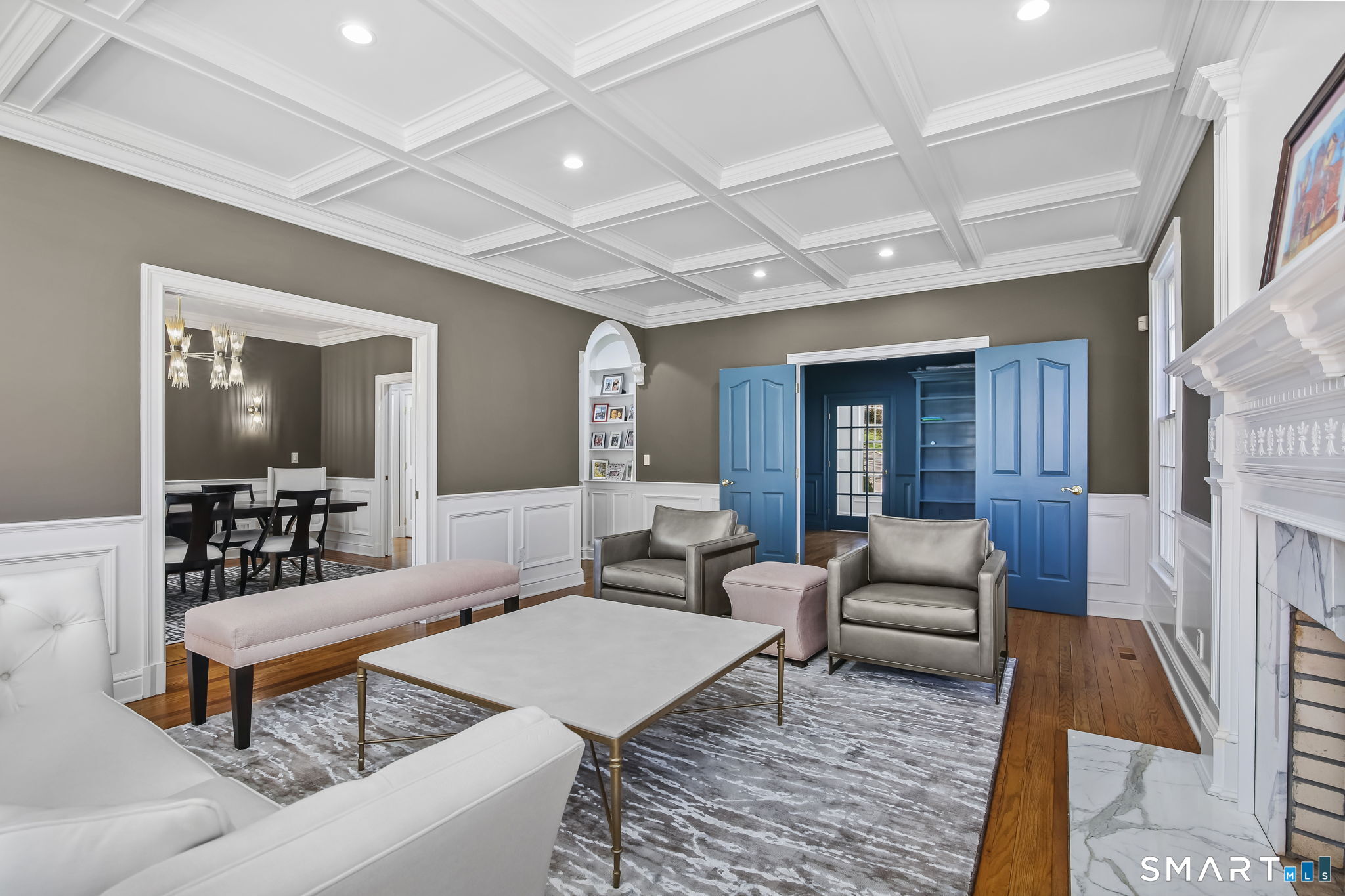 323 Smith Ridge Road New Canaan, CT 06840 - Photo 7 of 39 a living room with furniture and a flat screen tv