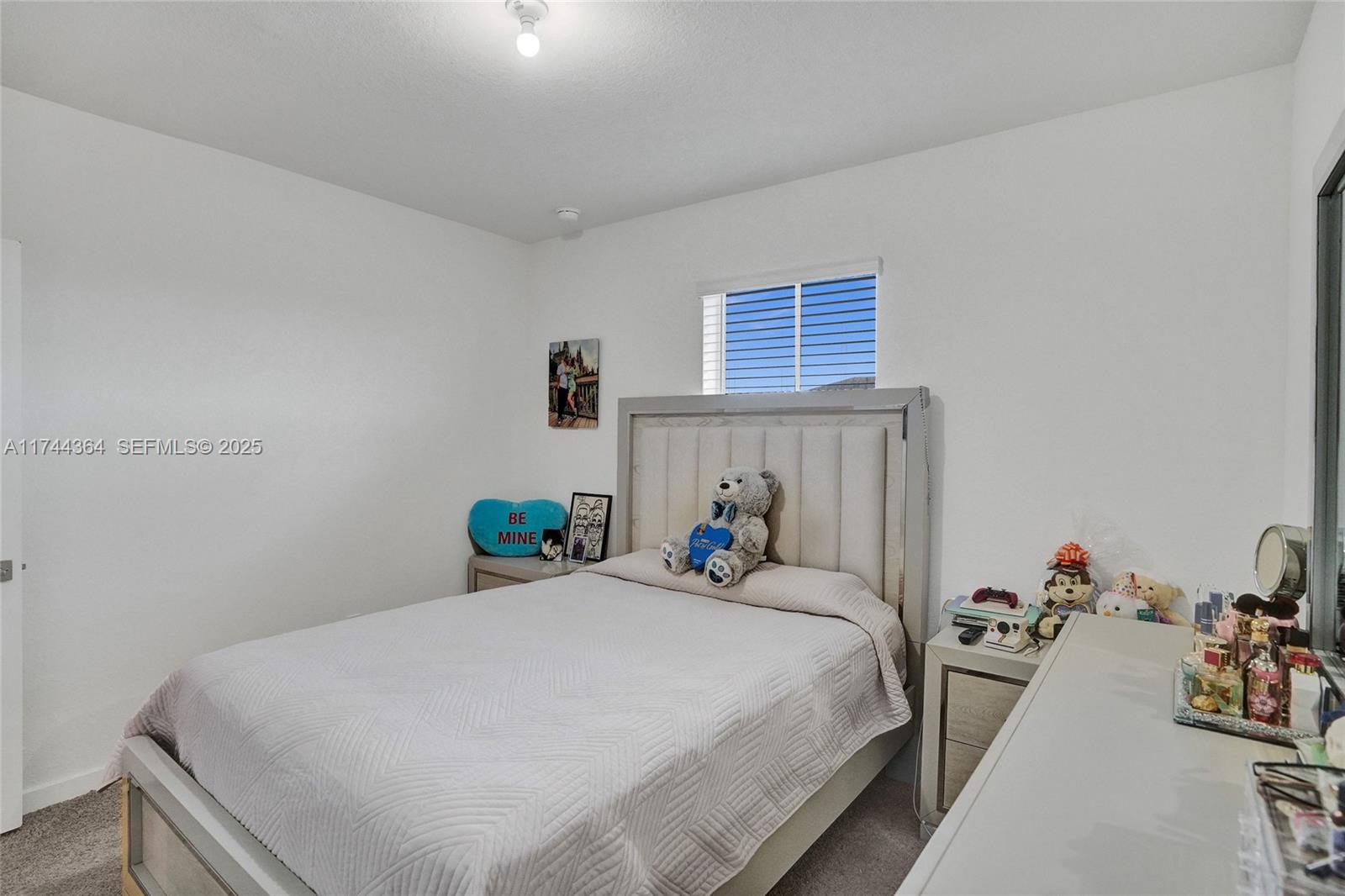 838 Southeast 17 Street Homestead, FL 33034 - Photo 21 of 66 a bedroom with bed and a window