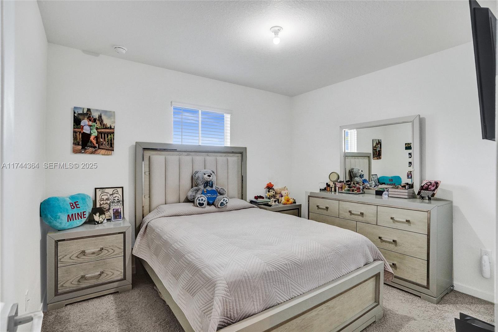 838 Southeast 17 Street Homestead, FL 33034 - Photo 23 of 66 a bedroom with a bed and a dresser