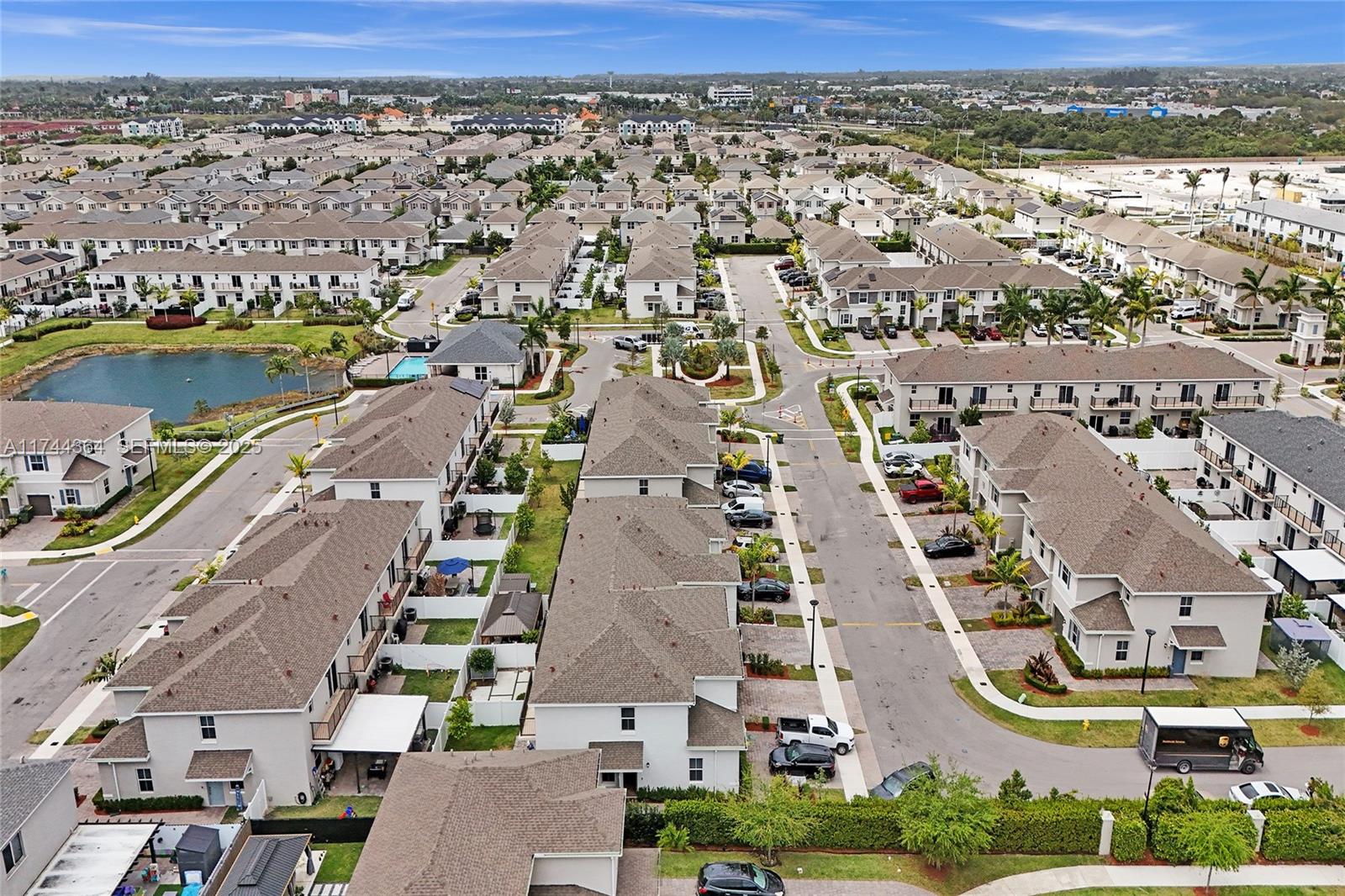 838 Southeast 17 Street Homestead, FL 33034 - Photo 49 of 66 an aerial view of residential building and lake