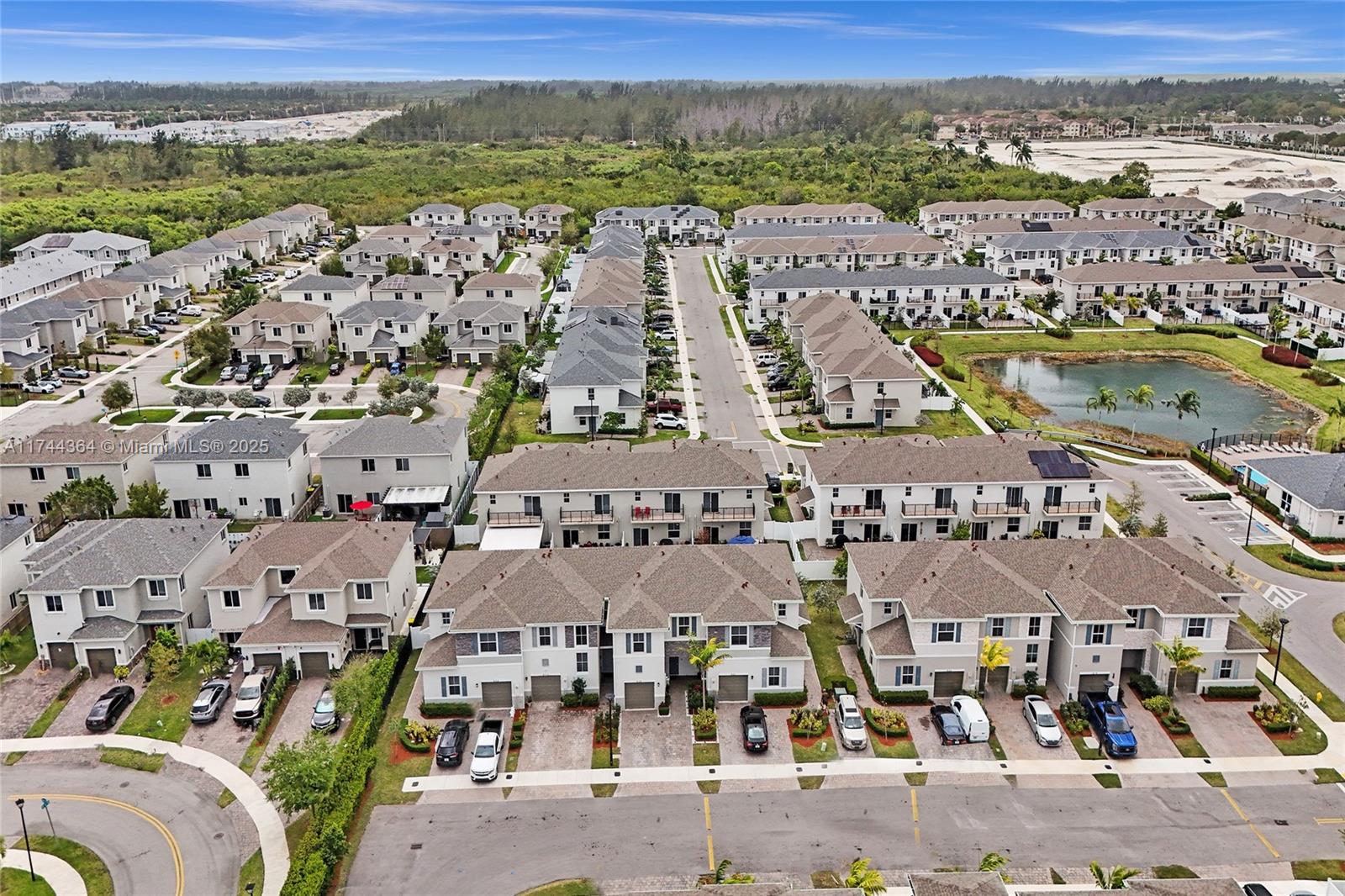 838 Southeast 17 Street Homestead, FL 33034 - Photo 55 of 66 an aerial view of a city with lots of residential buildings