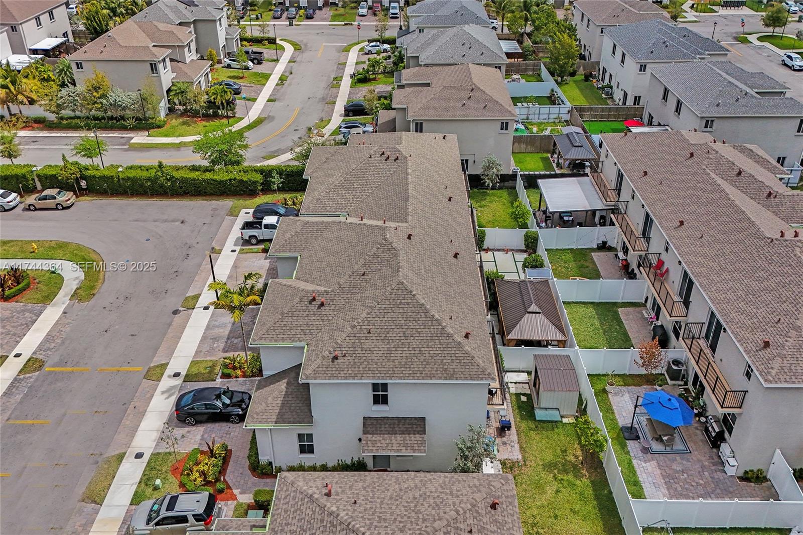 838 Southeast 17 Street Homestead, FL 33034 - Photo 61 of 66 an aerial view of multiple houses with yard