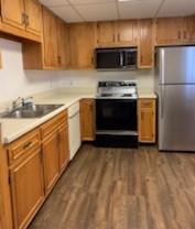 200 Sanders Ferry Road, Unit 1311 Hendersonville, TN 37075 - Photo 6 of 8 a kitchen with a refrigerator stove and microwave
