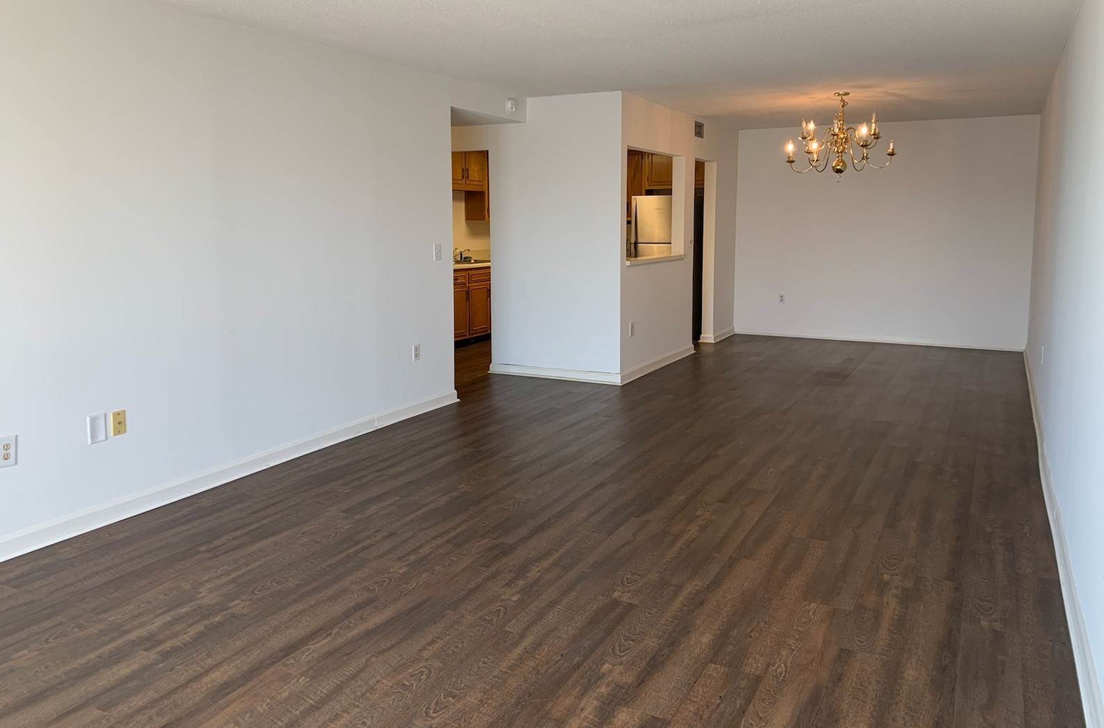 200 Sanders Ferry Road, Unit 1311 Hendersonville, TN 37075 - Photo 7 of 8 a view of an empty room with wooden floor