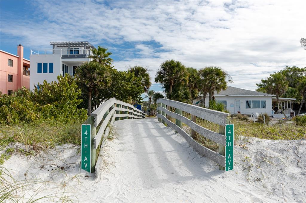 404 Maxwell Place Indian Rocks Beach, FL 33785 - Photo 42 of 66 a view of a house with backyard and trees