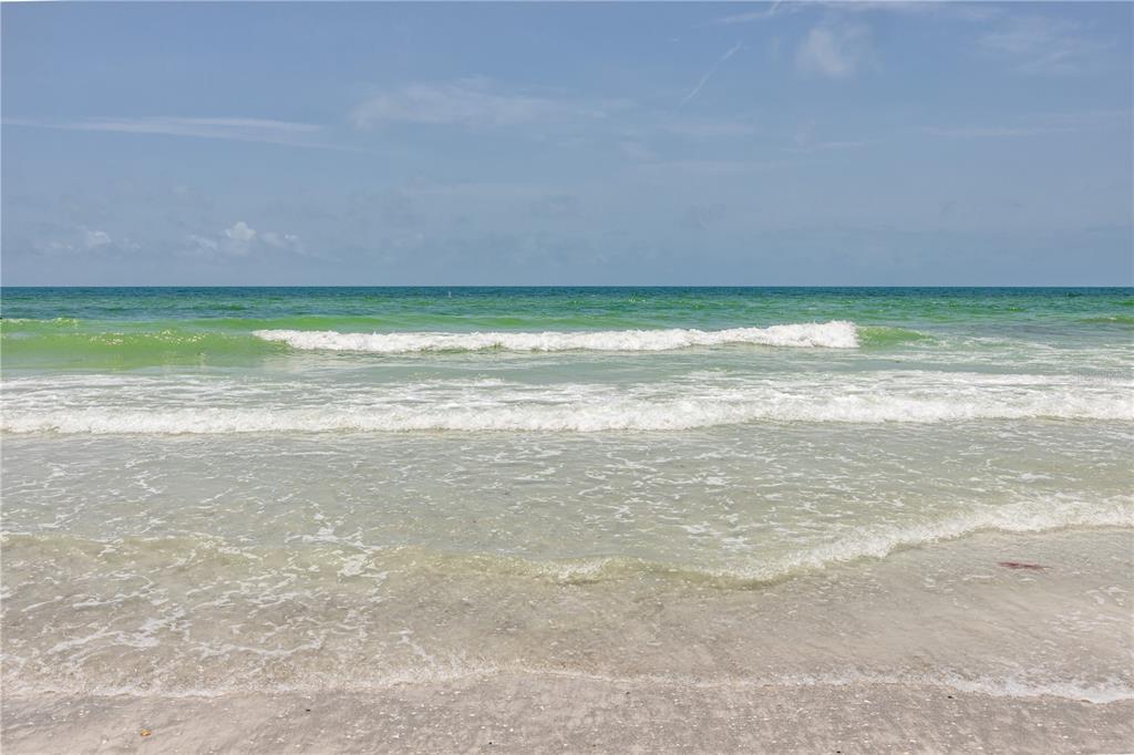 404 Maxwell Place Indian Rocks Beach, FL 33785 - Photo 54 of 66 a view of an ocean and beach