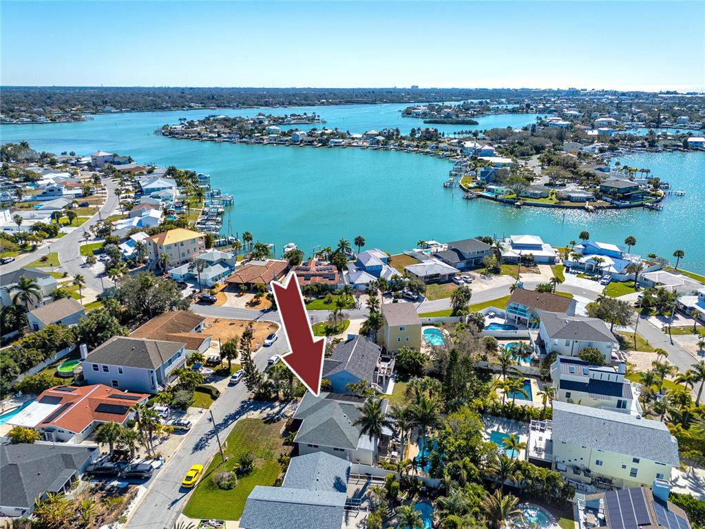 404 Maxwell Place Indian Rocks Beach, FL 33785 - Photo 59 of 66 an aerial view of a city with lots of residential buildings ocean and mountain view in back