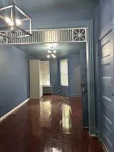 a view of wooden floor and chair