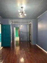 a view of small space with wooden floor