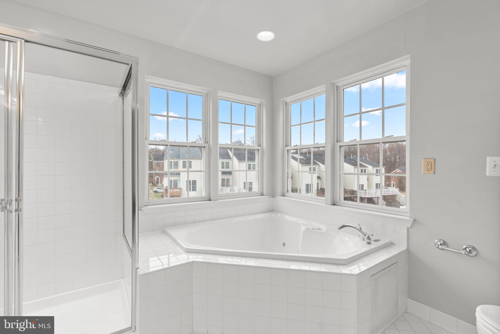 2475 Jostaberry Way Odenton, MD 21113 - Photo 26 of 53 a white bath tub sitting next to a window