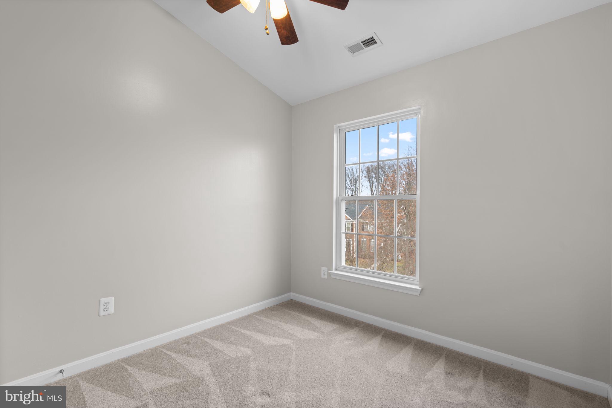 2475 Jostaberry Way Odenton, MD 21113 - Photo 30 of 53 an empty room with windows and fan