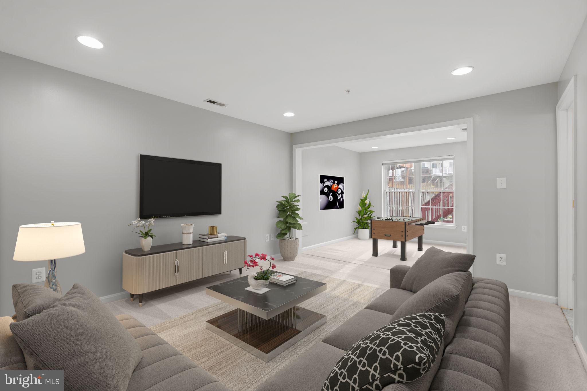 2475 Jostaberry Way Odenton, MD 21113 - Photo 37 of 53 a living room with furniture and a flat screen tv