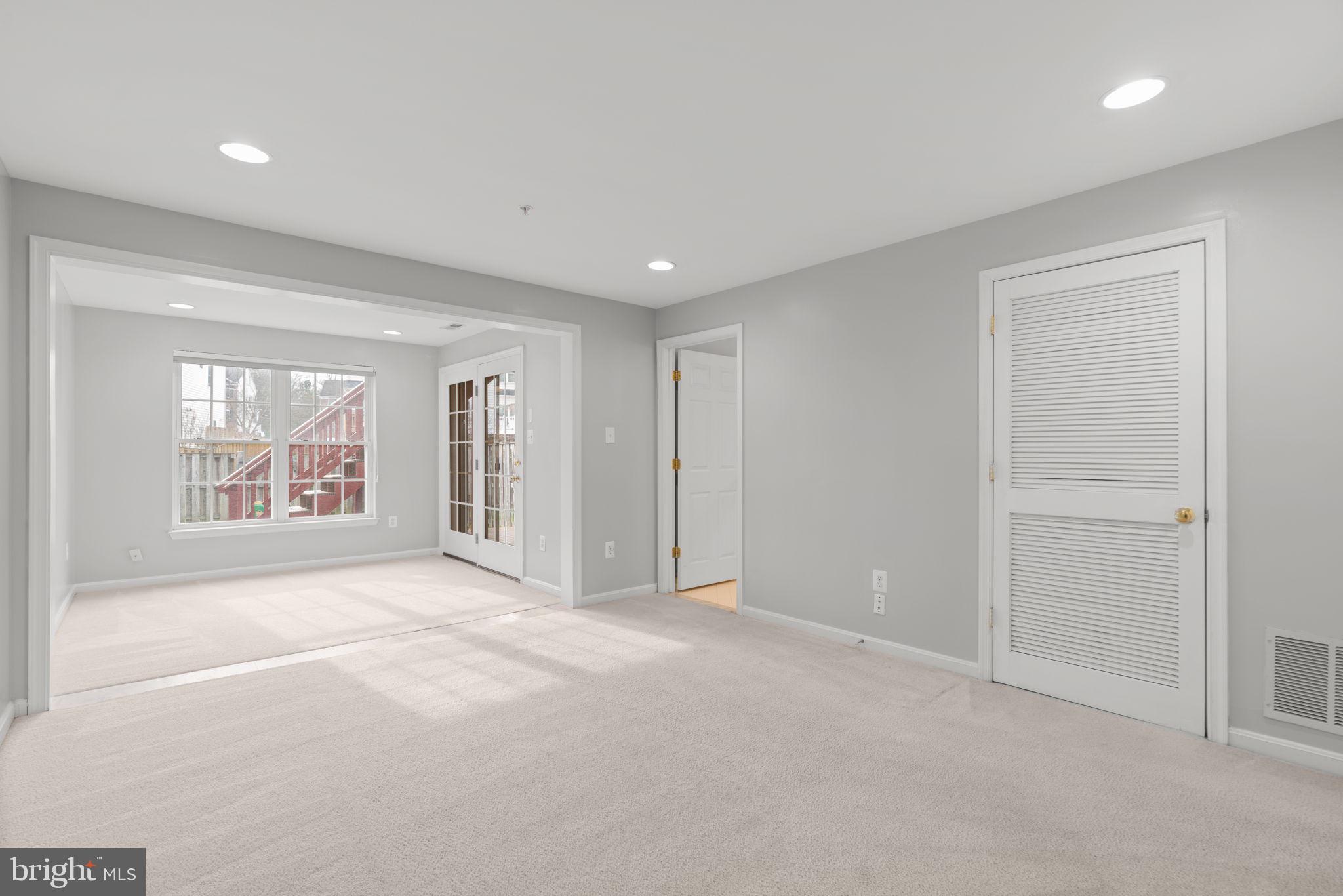 2475 Jostaberry Way Odenton, MD 21113 - Photo 39 of 53 an empty room with windows and closet