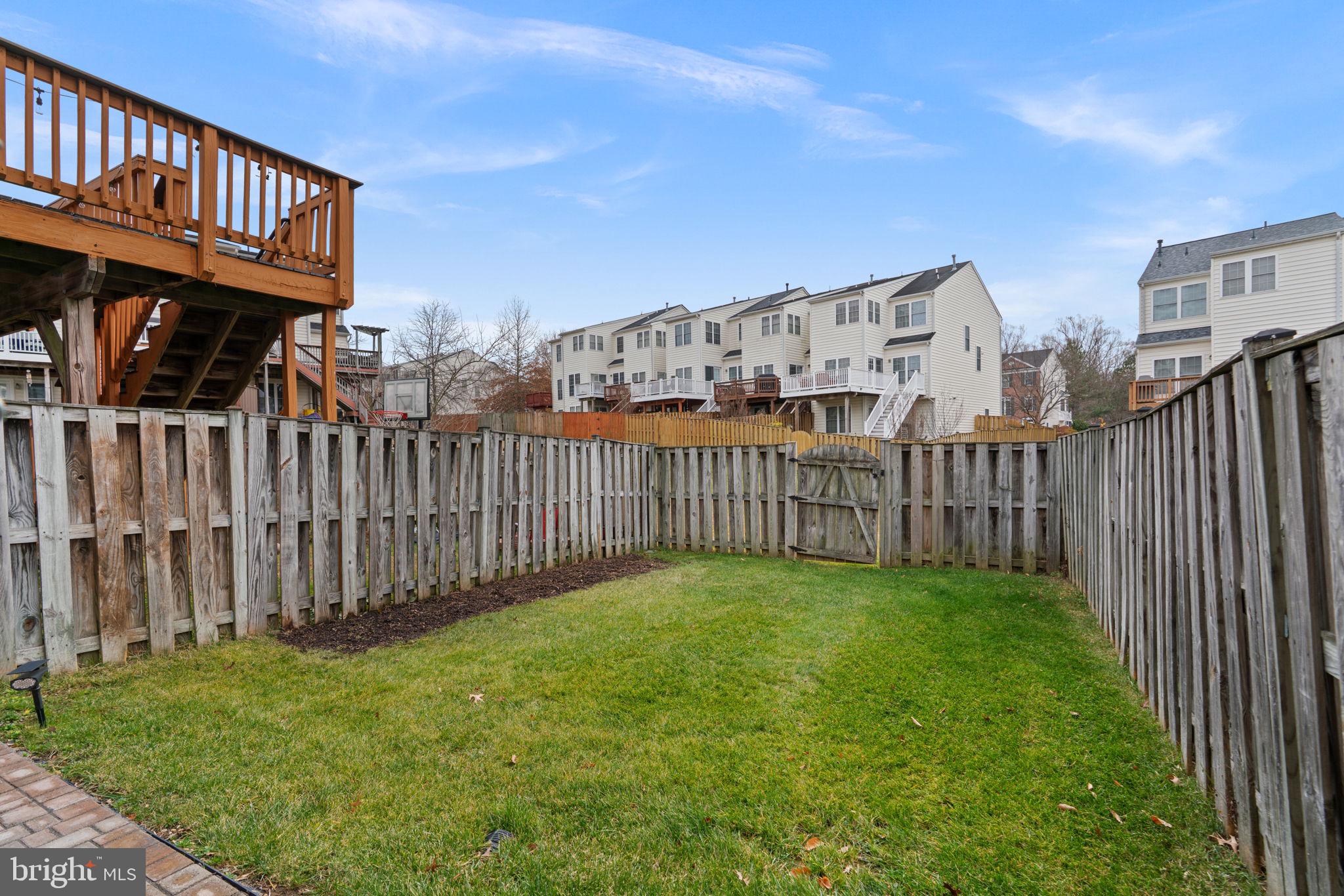 2475 Jostaberry Way Odenton, MD 21113 - Photo 45 of 53 a view of a backyard with wooden fence