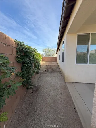 a view of a house with a street