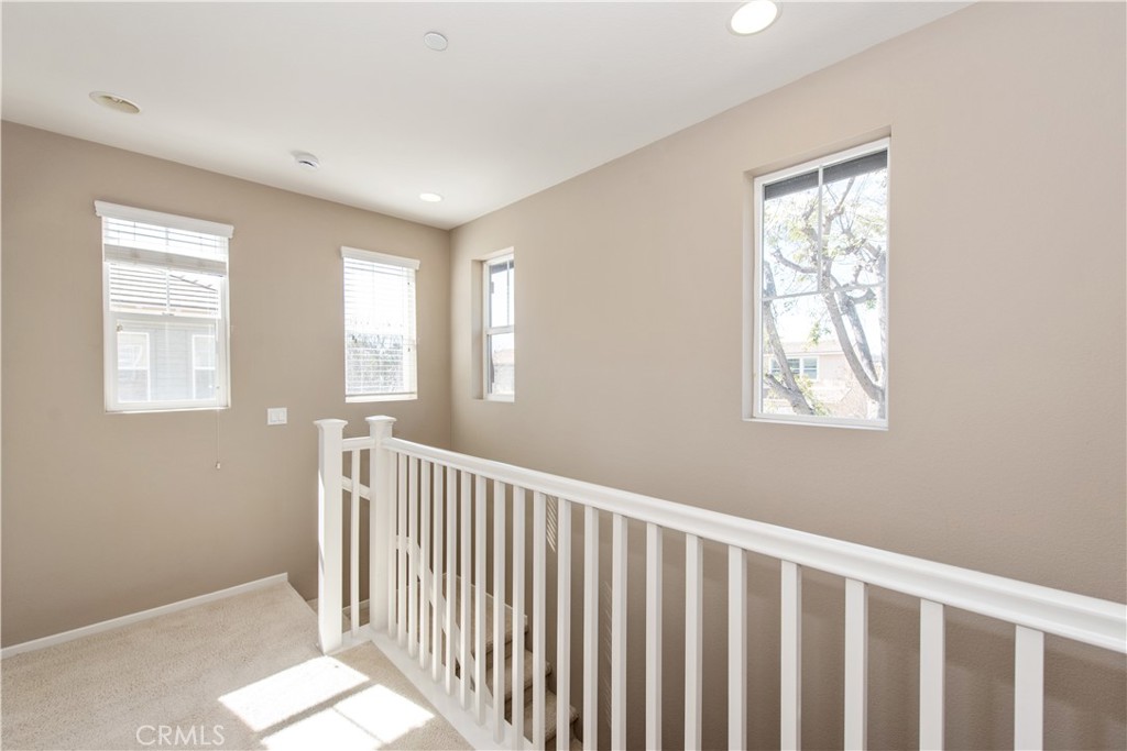 148 Compass Irvine, CA 92618 - Photo 14 of 26 a view of hallway with windows