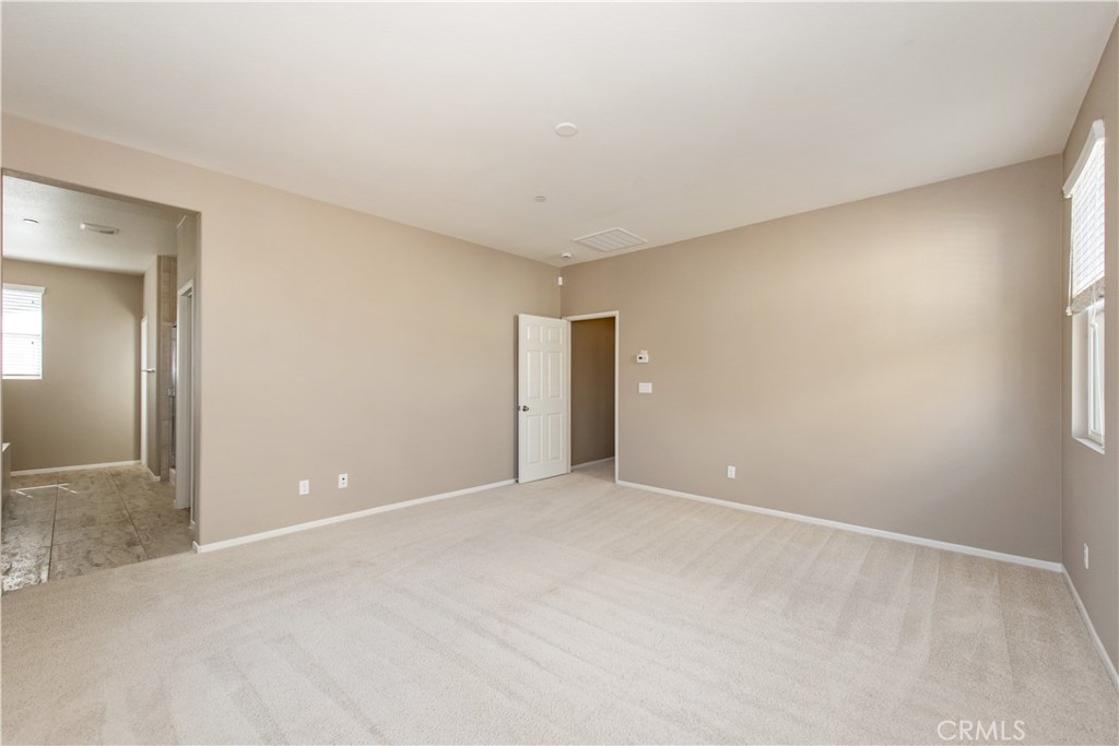 148 Compass Irvine, CA 92618 - Photo 16 of 26 an empty room with an entryway