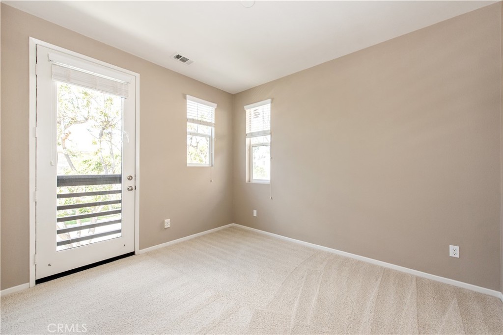 148 Compass Irvine, CA 92618 - Photo 22 of 26 a view of an empty room with a window