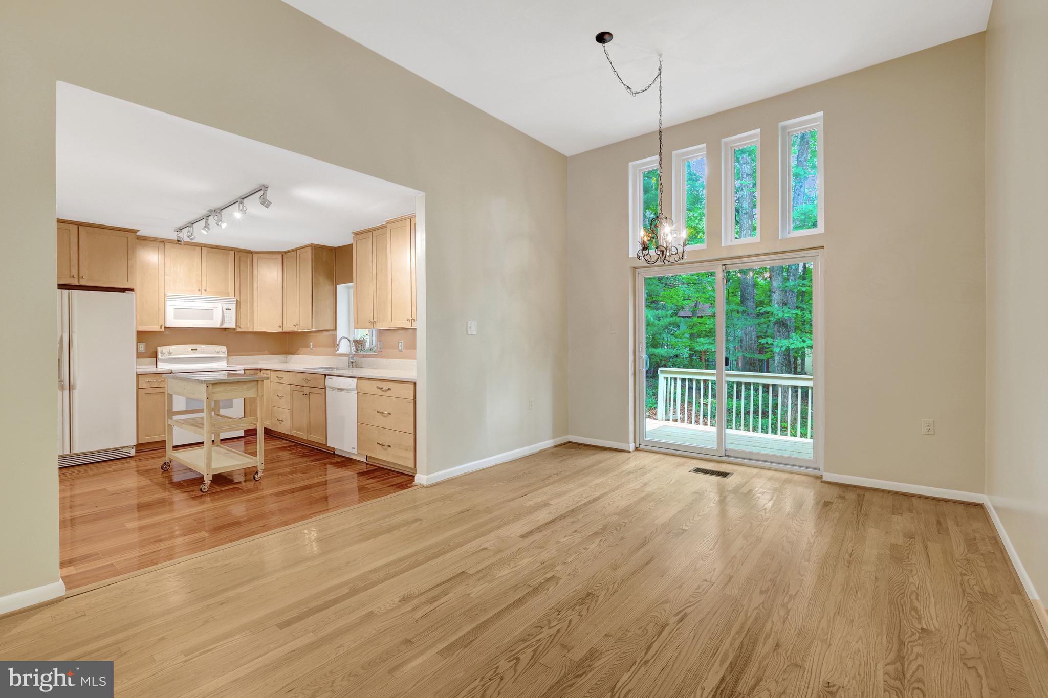 1591 Inlet Court Reston, VA 20190 - Photo 18 of 67 The kitchen opens to the large family room.