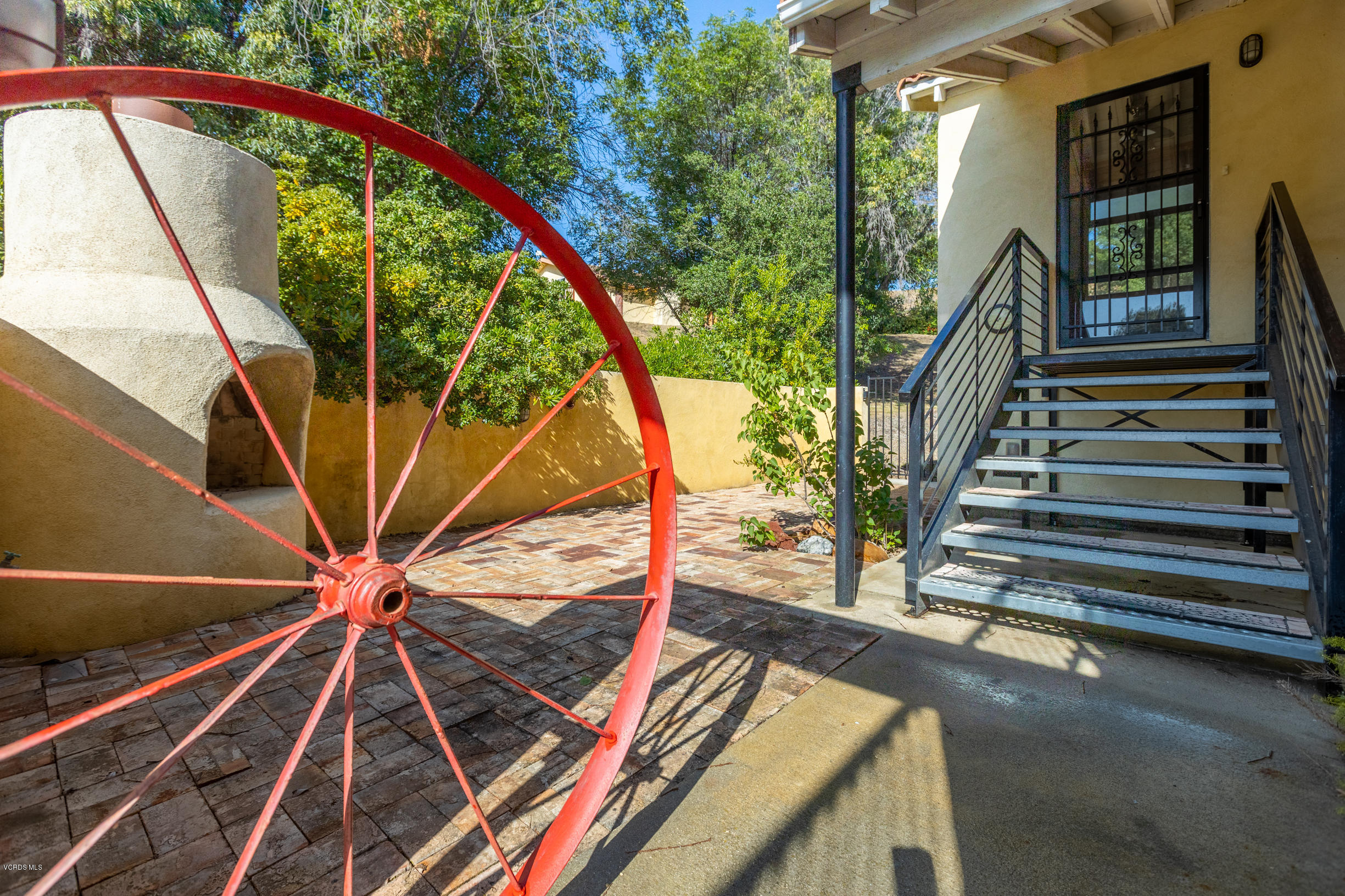 7240 Studio Road Canoga Park, CA 91304 - Photo 2 of 19 a view of an entryway with a small yard