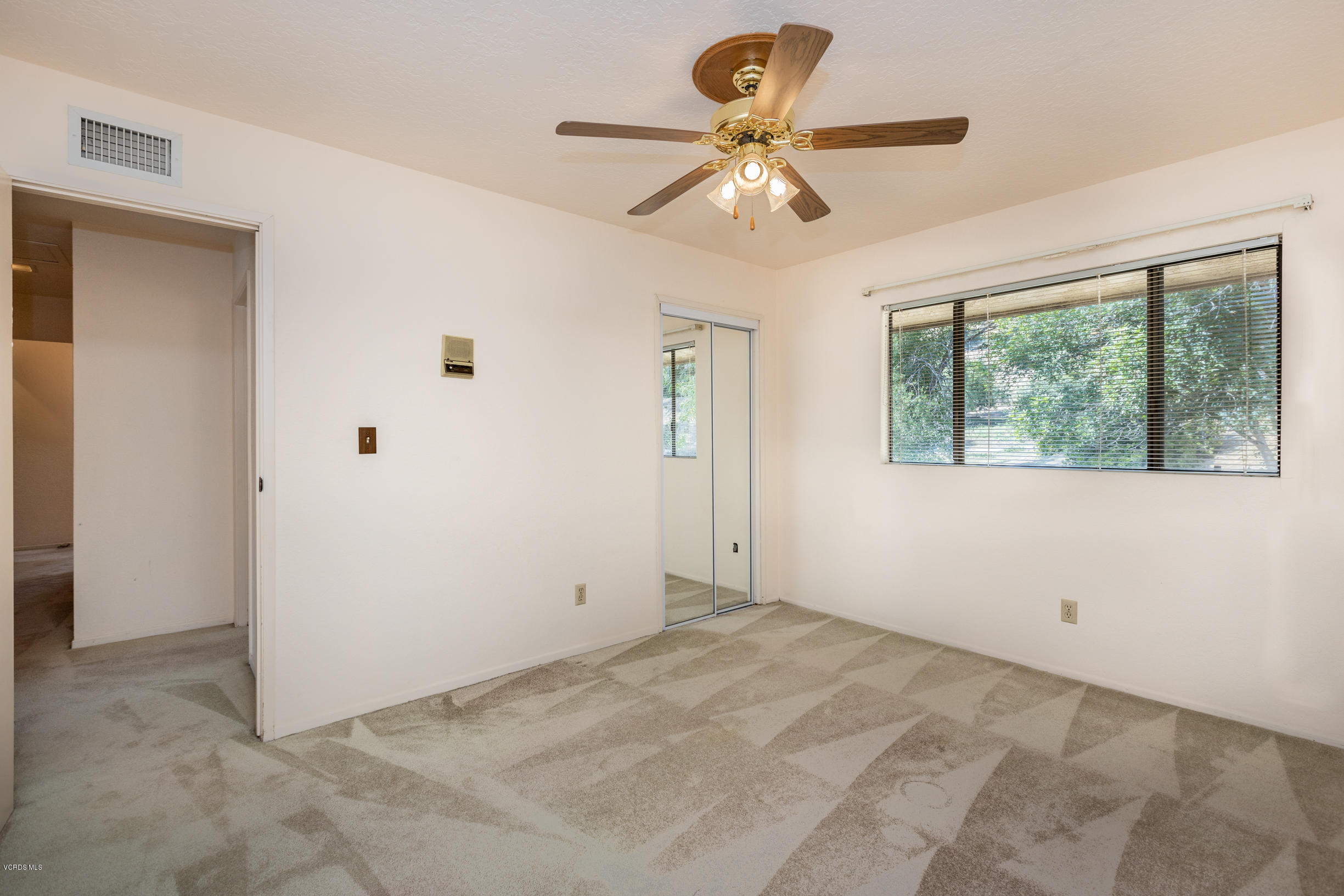 7240 Studio Road Canoga Park, CA 91304 - Photo 13 of 19 a view of room with window and ceiling fan