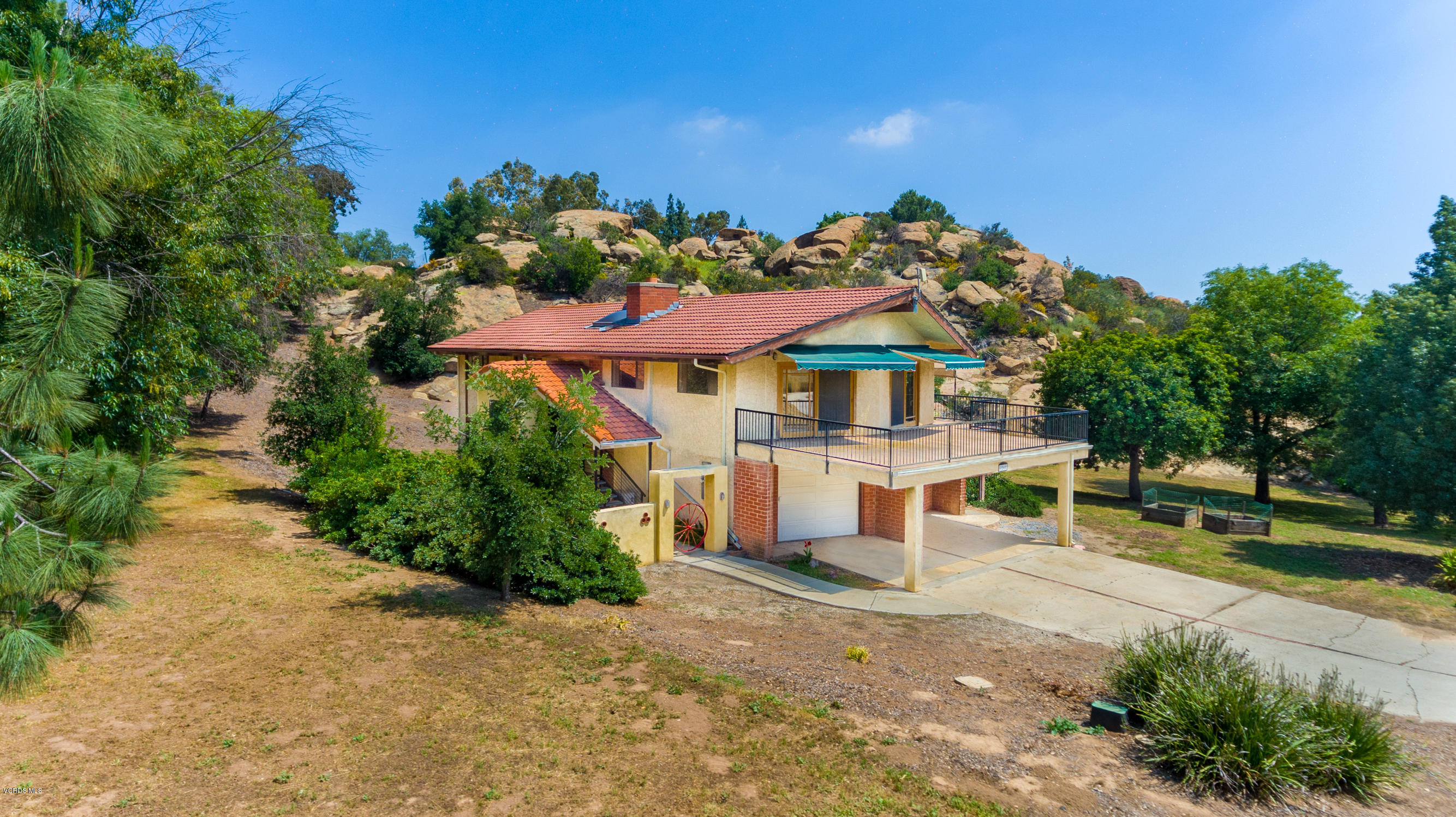 7240 Studio Road Canoga Park, CA 91304 - Photo 19 of 19 a view of a house with a yard and porch