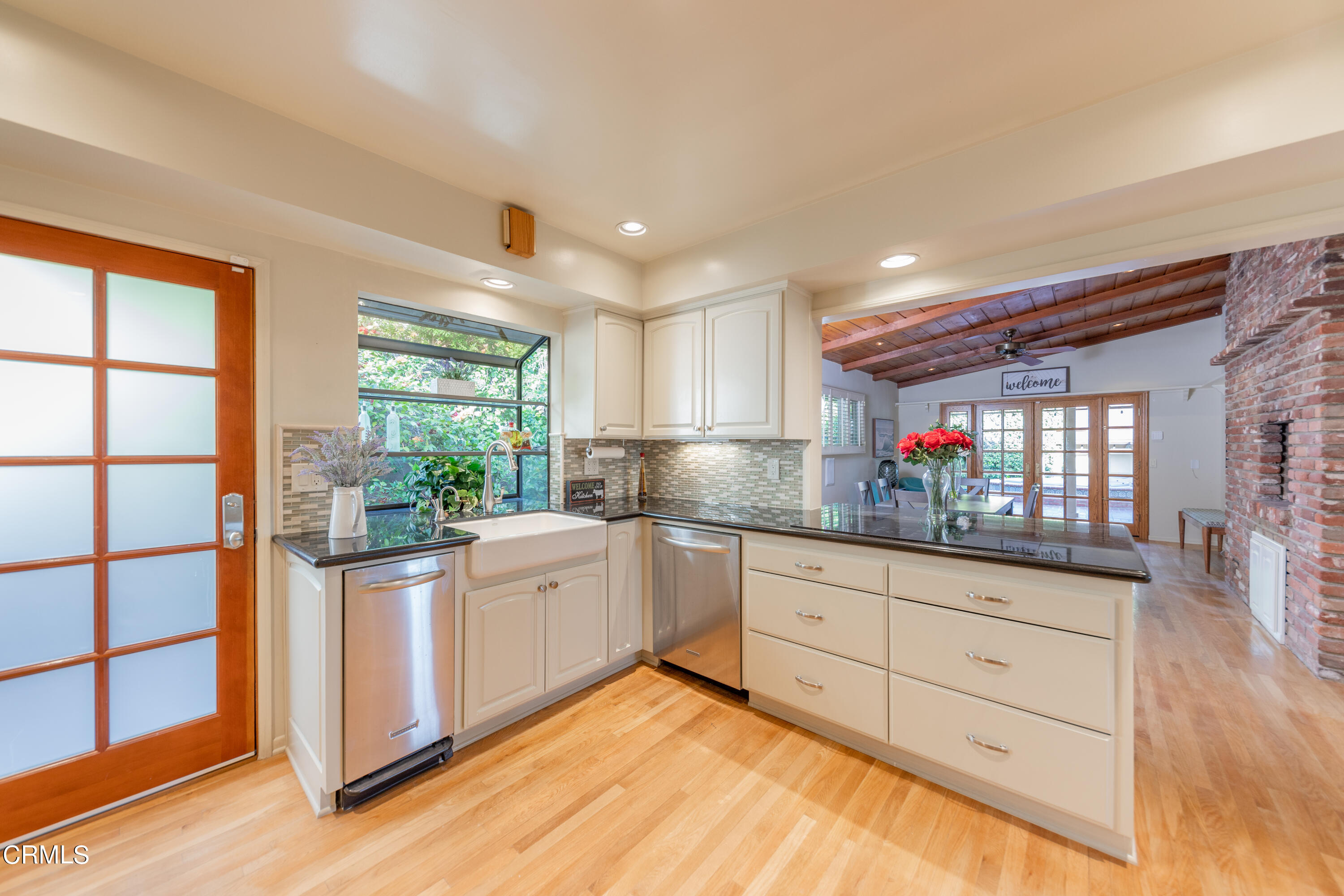5028 Ramsdell Avenue La Crescenta, CA 91214 - Photo 12 of 29 a kitchen with granite countertop white cabinets and window