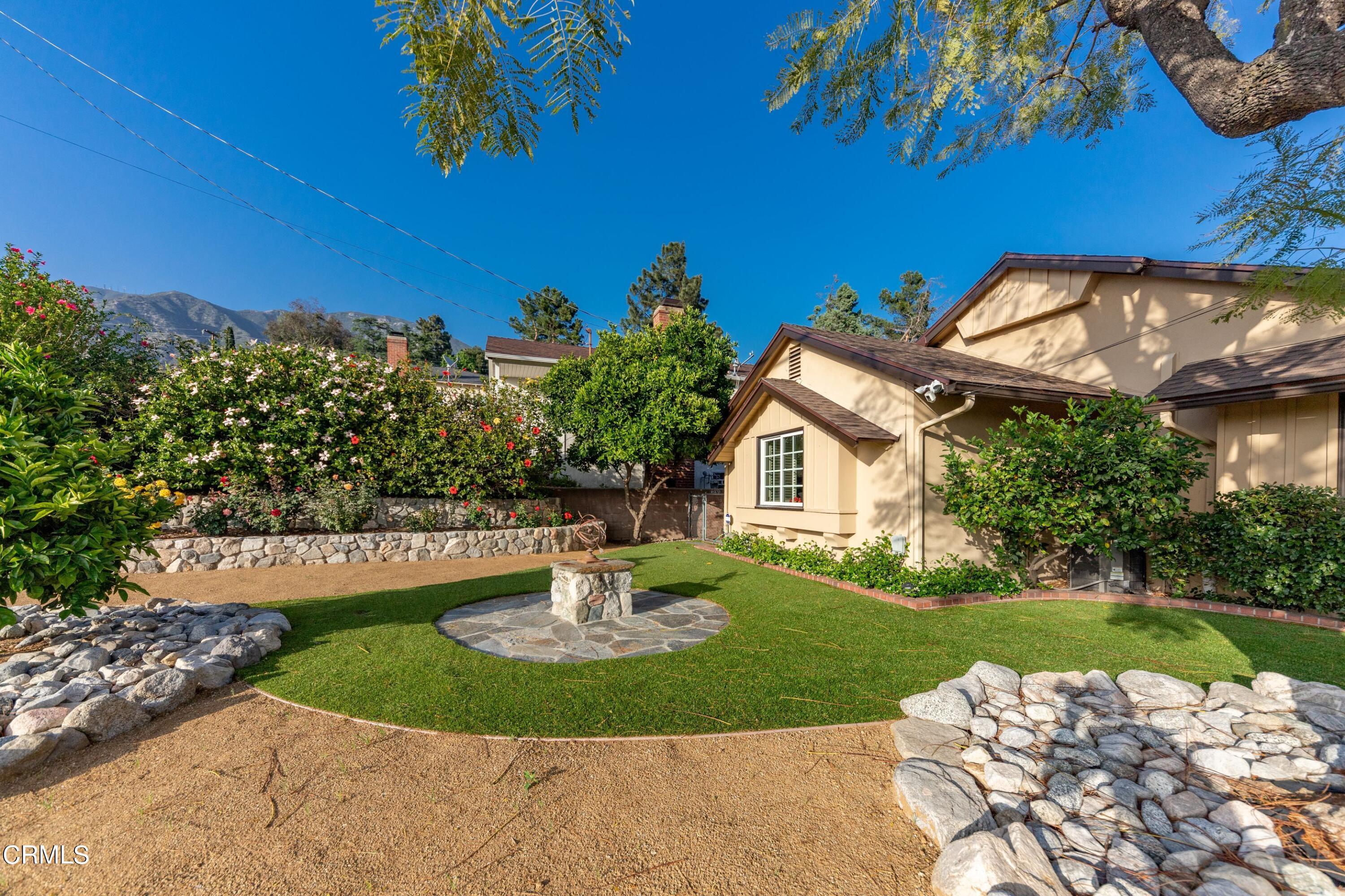 5028 Ramsdell Avenue La Crescenta, CA 91214 - Photo 21 of 29 a view of a house with a yard and sitting area