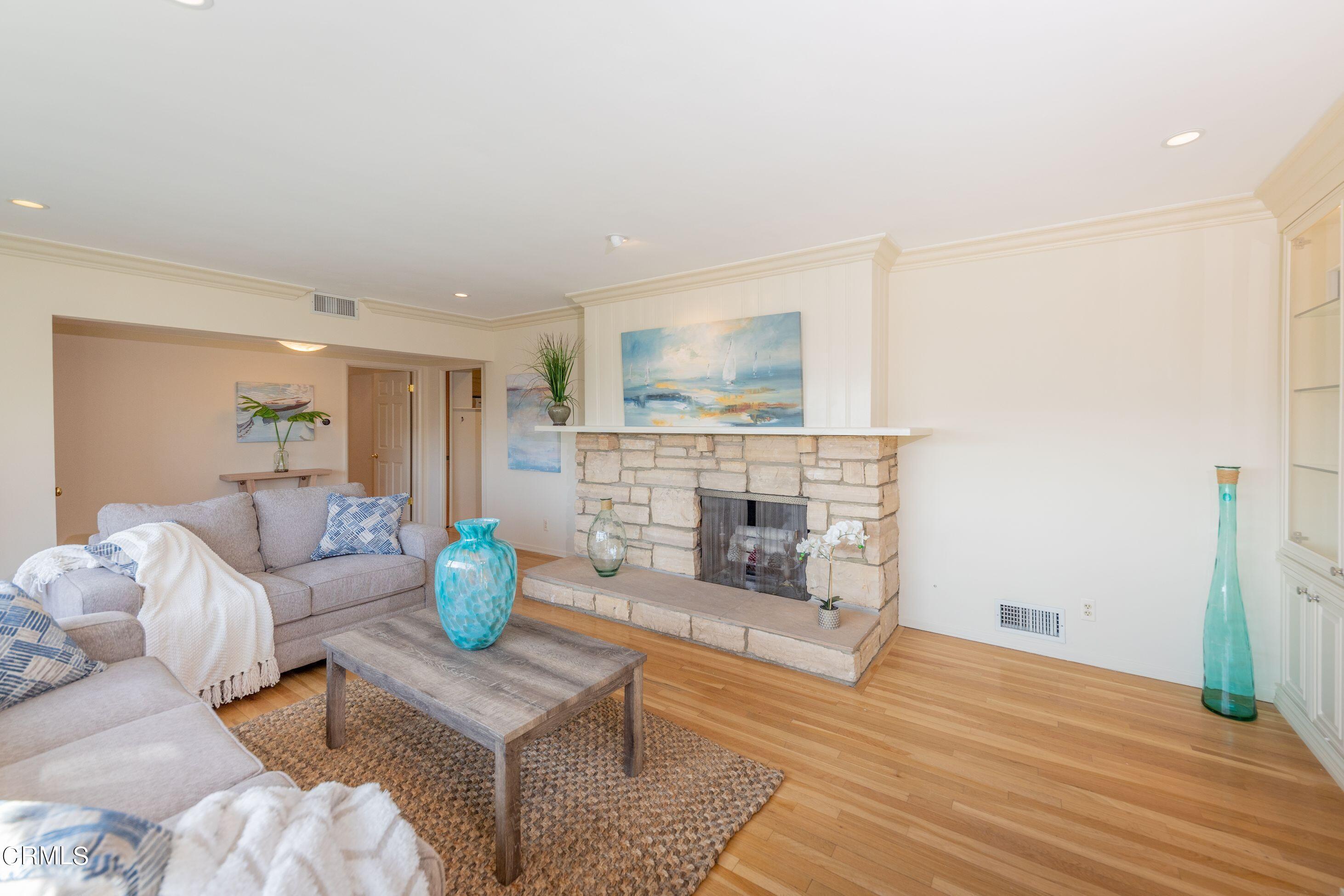 5028 Ramsdell Avenue La Crescenta, CA 91214 - Photo 4 of 29 a living room with furniture and a fireplace