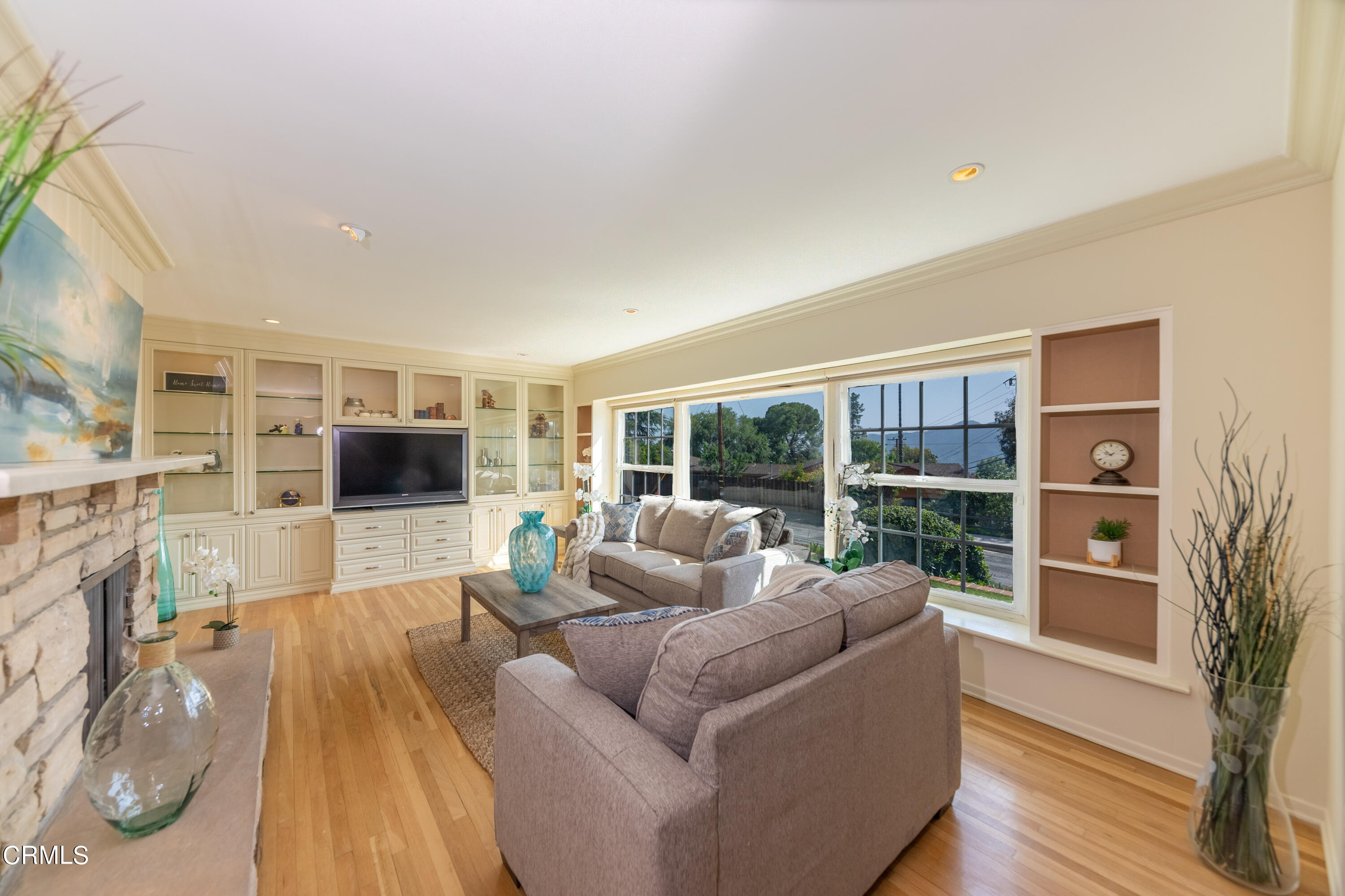 5028 Ramsdell Avenue La Crescenta, CA 91214 - Photo 6 of 29 a living room with furniture and a flat screen tv