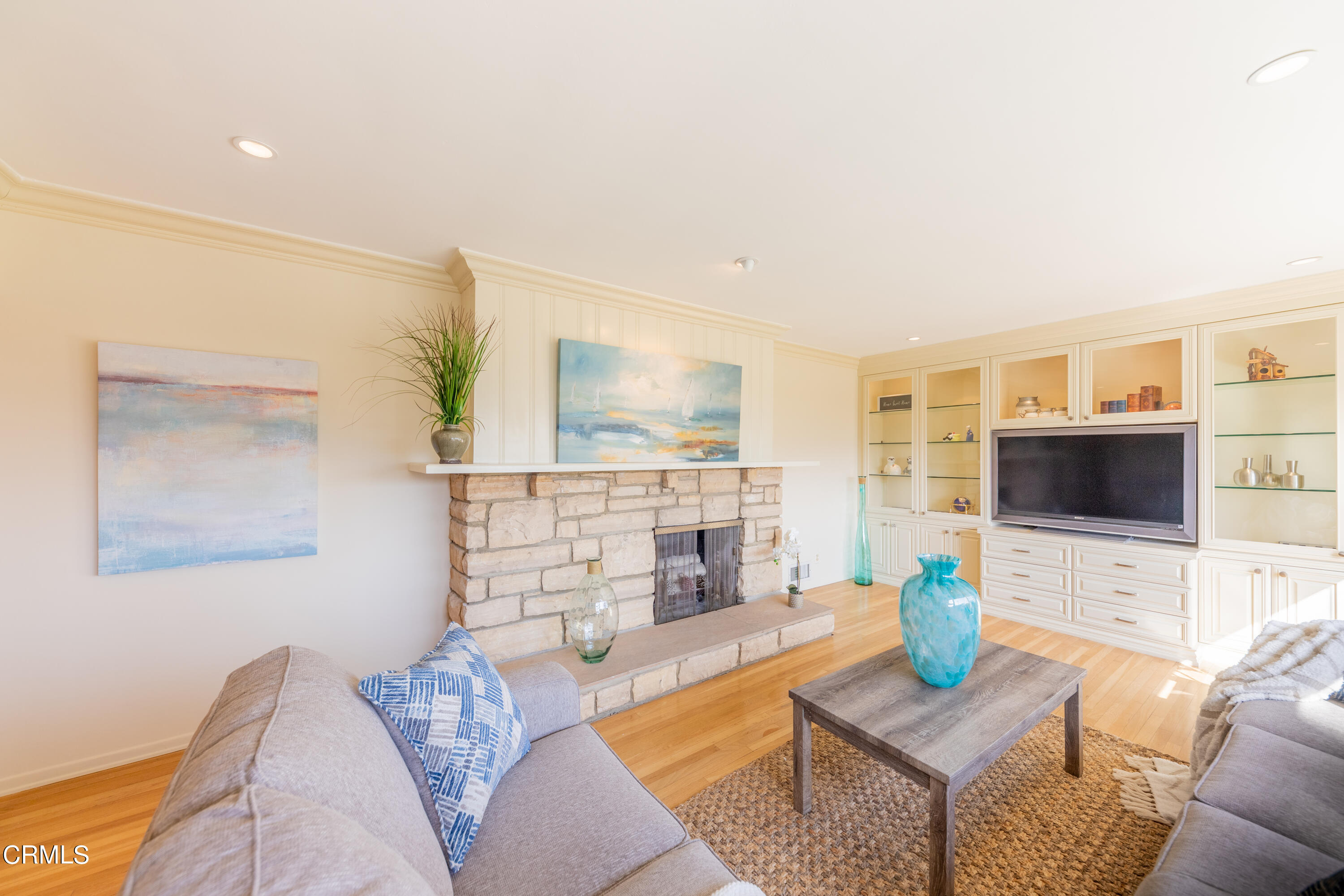 5028 Ramsdell Avenue La Crescenta, CA 91214 - Photo 7 of 29 a living room with fireplace furniture and a flat screen tv