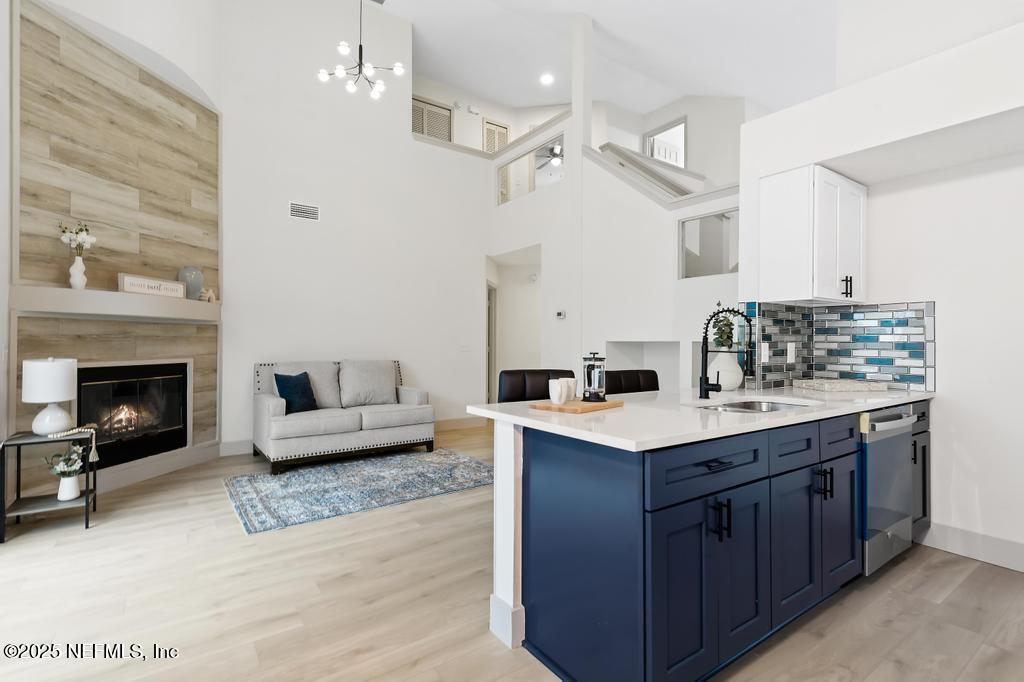 5497 Spring Brook Road Jacksonville, FL 32277 - Photo 16 of 54 a view of kitchen with cabinets and outdoor living space