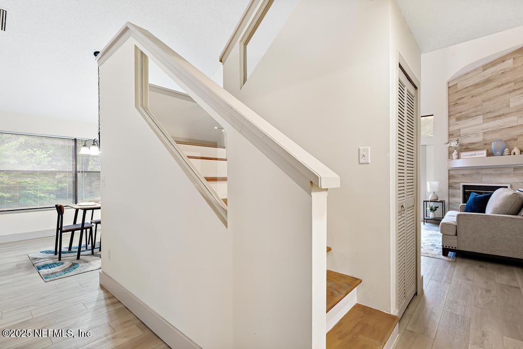 5497 Spring Brook Road Jacksonville, FL 32277 - Photo 34 of 54 a view of entryway and hall with wooden floor